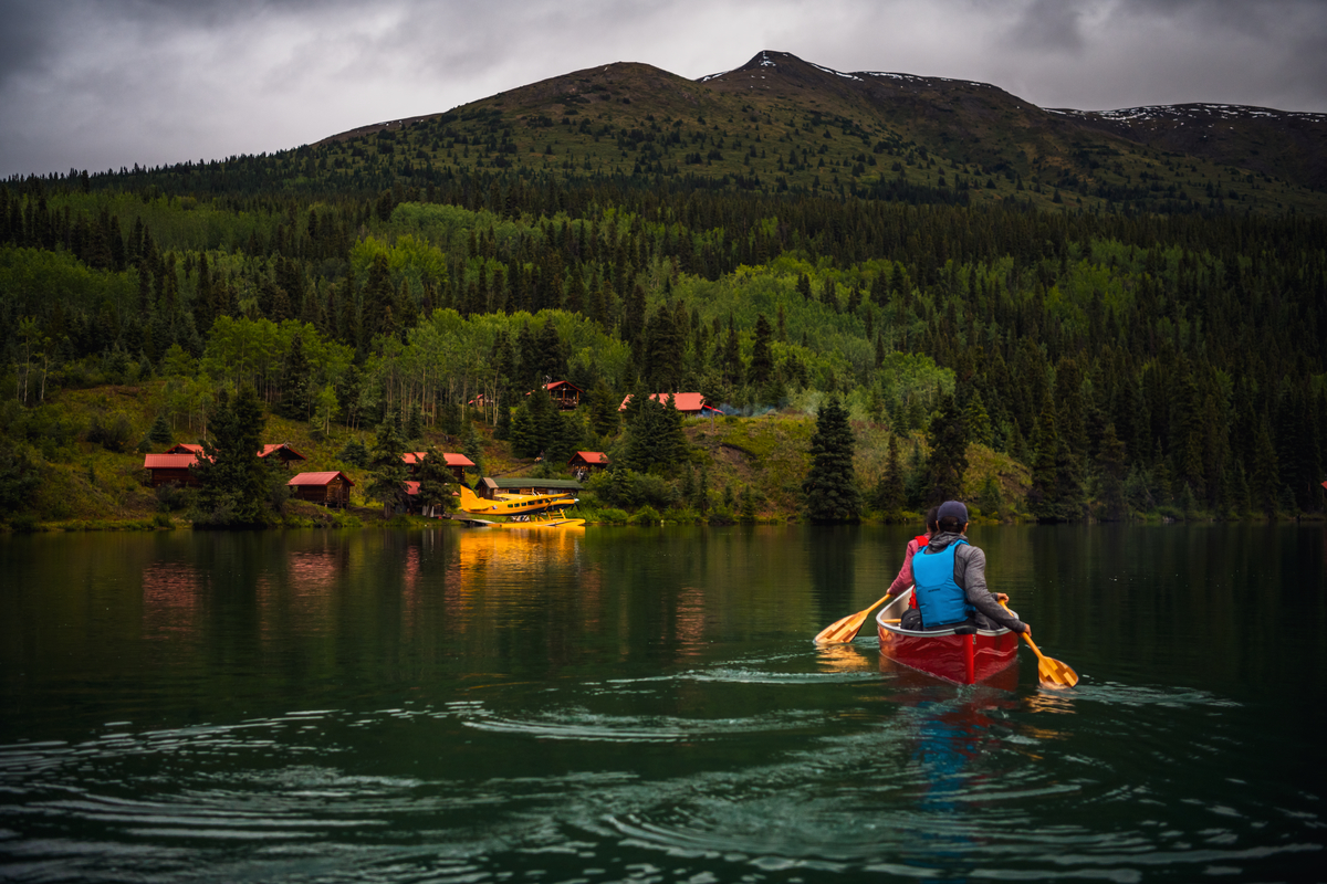 Paddling at Cold Fish Lake Camp in the Spatsizi Wilderness Plateau. Photo: Northern BC Tourism/Andrew Strain